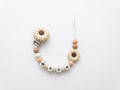 Nuggikette / Schnullerkette personalisiert mit Name, Geschenk zur Geburt -  Blume Beige