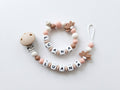 Nuggikette und Beissring personalisiert mit Namen - Baby Geschenk Lotusblume