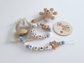 Baby Geschenk personalisiert mit Namen - Rasselpalme/Otter