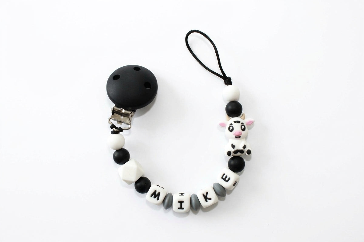 Nuggikette / Schnullerkette personalisiert mit Name, Geschenk zur Geburt - Kuh